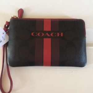 Coach striped Cosmetic wristlet